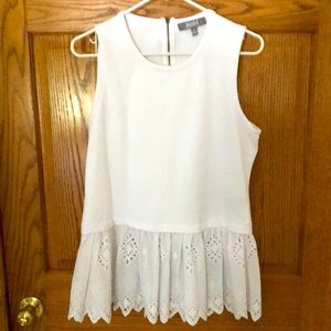 White sleeveless blouse